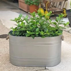 Maison Tilleul Pots, Cache-pots Et Jardinières D'extérieur Jardinière Ovale En Métal Gris -Parasols Soldes Magasin jardiniere ovale en metal gris 1